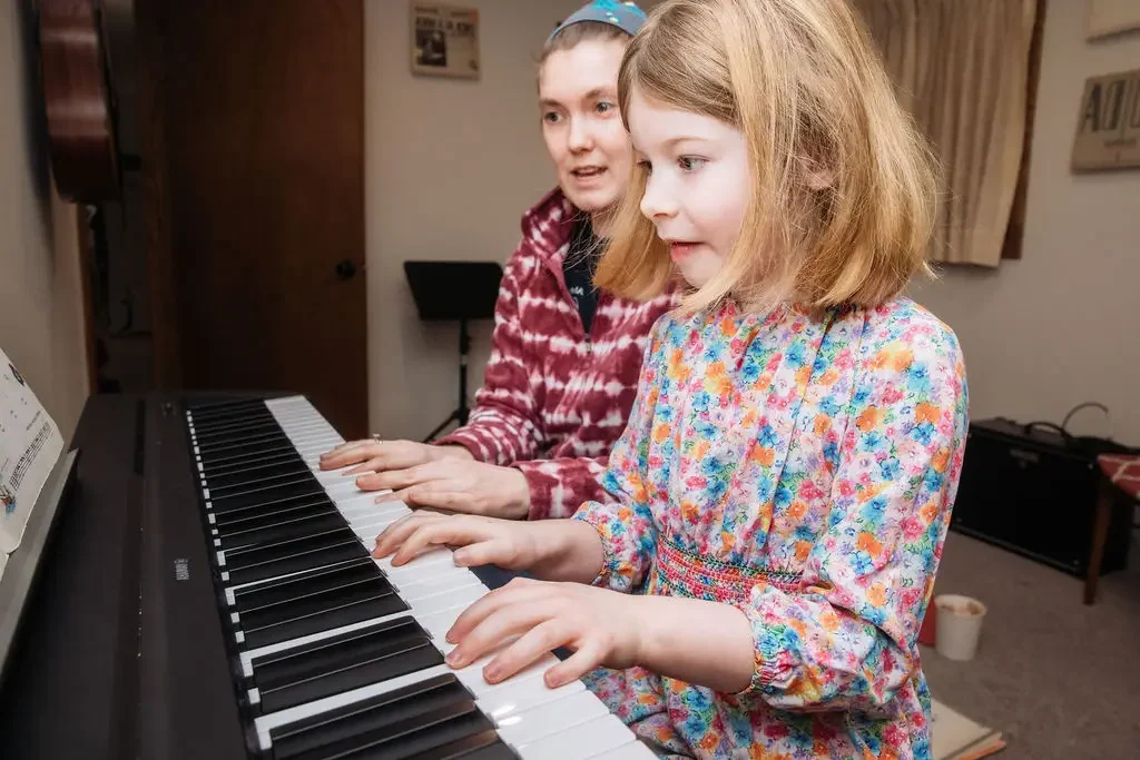 Piano Teacher and Student